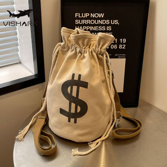 Canvas bag with $$$ pattern on the surface, for carrying on the shoulders.